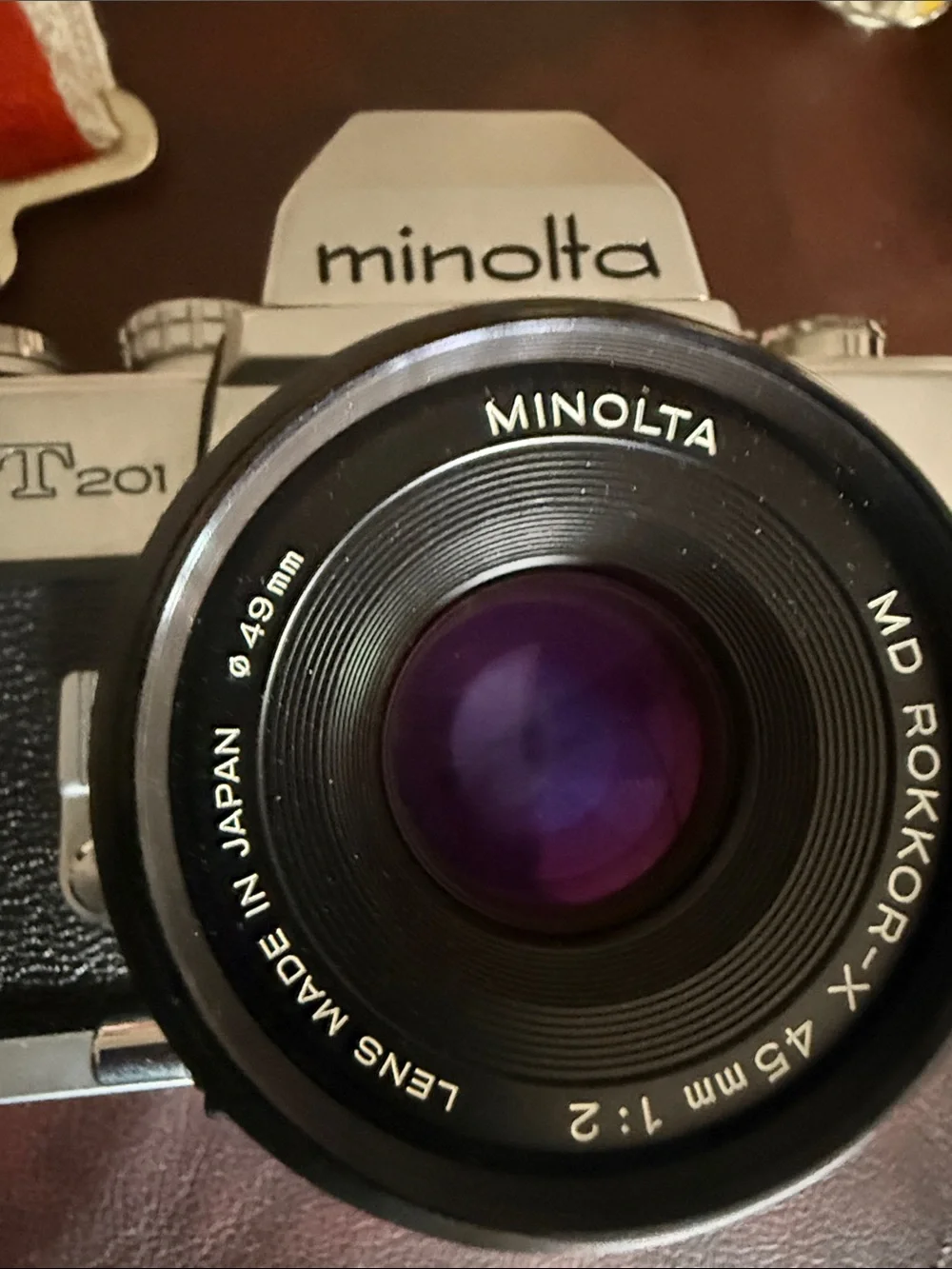 Minolta SR-T 201 35mm Film Camera in Silver and Black with Retro Stripe Strap